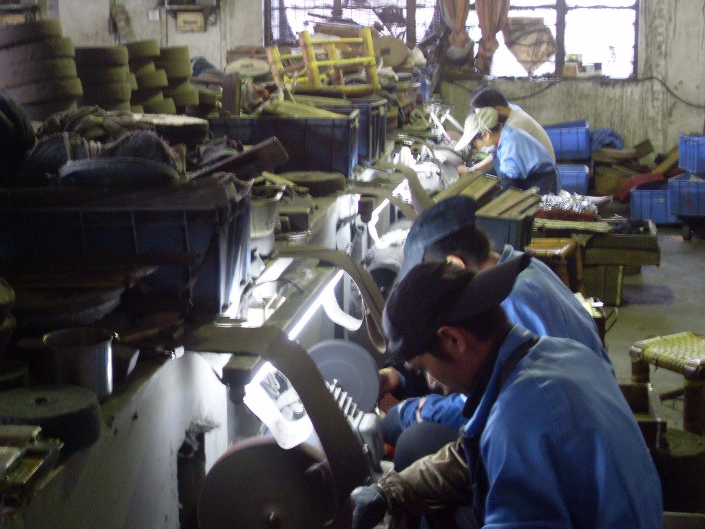 Worker at production line